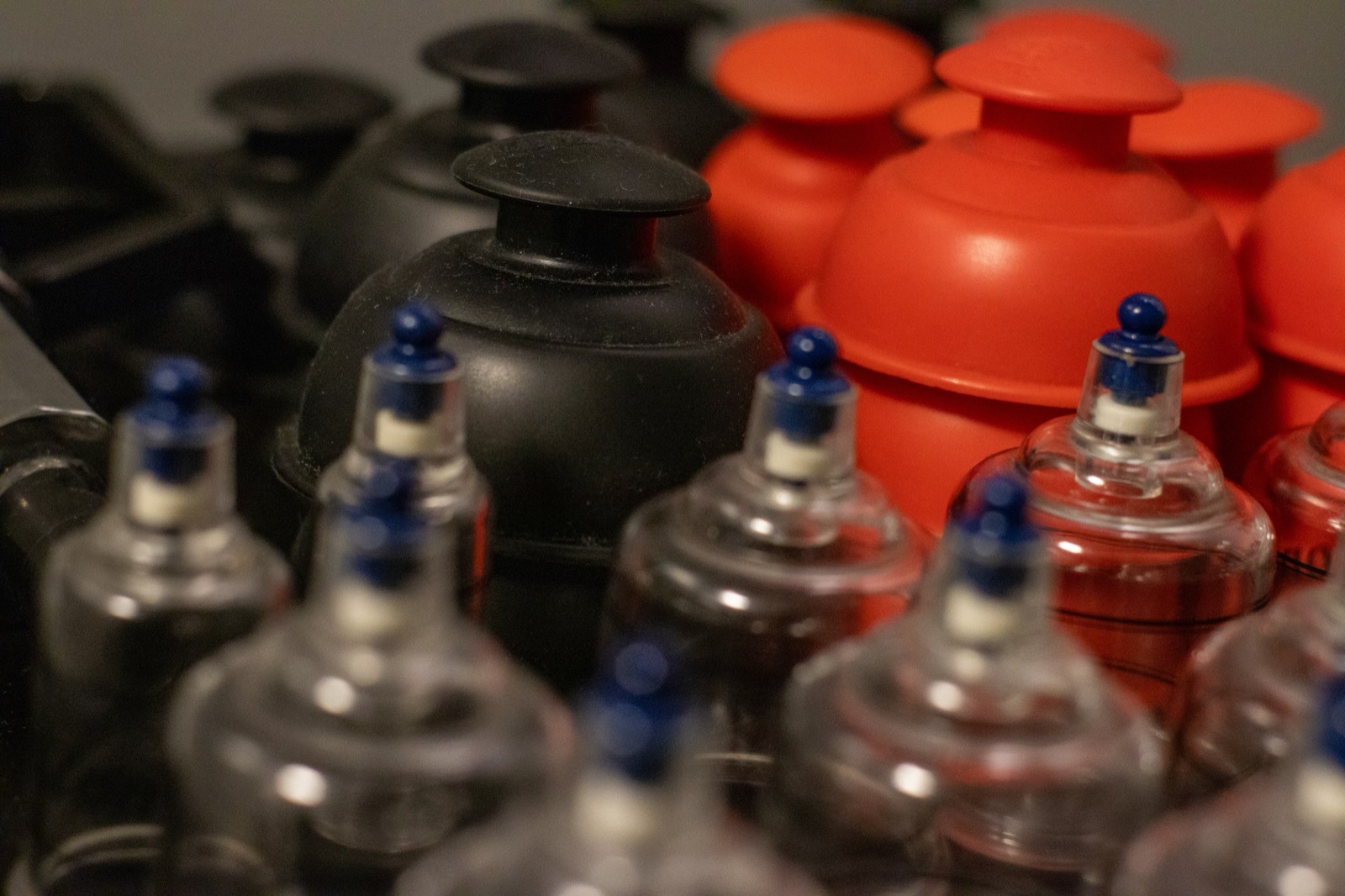Silicone and glass cupping cups used for soft-tissue recovery